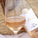 Bottle and glass of As ever Rosé wine on a textured surface
