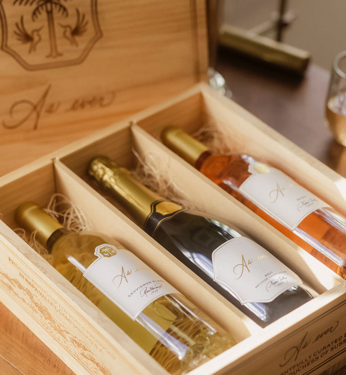Three bottles of As ever wine in an As ever wooden crate